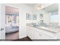Bathroom with double vanity and granite countertop at 204 Sundrop Way, Conway, SC 29526