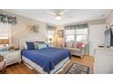 Spacious bedroom with a queen-size bed and a sitting area at 241 Atlantic Ave., Pawleys Island, SC 29585