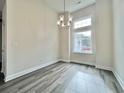 Dining area with hardwood floors and a large window at 4959 Old Highway 90, Conway, SC 29526