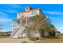 Beautiful two-story home with a two-car garage and spacious yard at 338 Harbour View Dr., Myrtle Beach, SC 29579