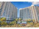 Two high-rise buildings near the beach with cabanas at 4800 Ocean Blvd. S # 915, North Myrtle Beach, SC 29582