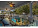 Spacious deck with outdoor seating and glass-top table at 6001 - P-29 S Kings Hwy., Myrtle Beach, SC 29575