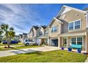 Townhouse community showcasing multiple homes with similar design at 747 Riverward Dr. # 747, Myrtle Beach, SC 29588