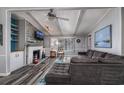 Spacious living room featuring a cozy fireplace and comfy sectional sofa at 1109 Cypress Cove, North Myrtle Beach, SC 29582