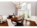 Formal dining room featuring hardwood floors and an oval table at 2073 Timmerman Rd., Myrtle Beach, SC 29588