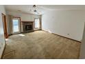 Spacious living room featuring a fireplace and vaulted ceiling at 319 Rice Mill Dr., Myrtle Beach, SC 29588