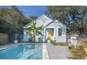 Inviting backyard pool with patio and lush tropical plants at 332 N Congdon St., Georgetown, SC 29440