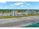 Aerial view of beachfront condo building and beach at 4305 S Ocean Blvd. # 302, North Myrtle Beach, SC 29582