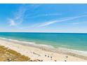 Expansive aerial view of beach with ocean and people at 300 N Ocean Blvd. # 1628, North Myrtle Beach, SC 29582