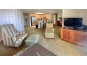 Spacious living room with comfortable seating and kitchen views at 9994 Beach Club Dr. # 1806, Myrtle Beach, SC 29572