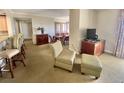 Open floor plan with dining area and seating at 9994 Beach Club Dr. # 1806, Myrtle Beach, SC 29572
