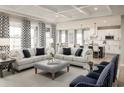 Open concept living room and kitchen with neutral decor and hardwood floors at 7071 Denim Loop, Myrtle Beach, SC 29575