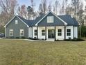 Two-story house with gray siding and white accents at Tbd Highway 9 Business W, Loris, SC 29569