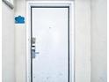 White condo unit entrance with keyless entry at 2711 S Ocean Blvd. # 1522, North Myrtle Beach, SC 29582