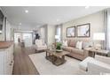 Spacious living room with hardwood floors and neutral decor at 301 Bent Green Ct. # 84F, Murrells Inlet, SC 29576