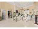 Elegant living room featuring ornate furniture and a large chandelier at 1501 Serena Dr., Myrtle Beach, SC 29579