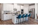 Modern kitchen featuring white cabinetry, granite countertops, and stainless steel appliances at 1212 Arizona Dr., Longs, SC 29568