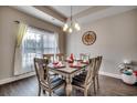 Well-lit dining room featuring a square table and six chairs at 124 Barons Bluff Dr., Conway, SC 29526