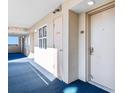 Hotel hallway with carpet, door to room 1033, and ocean view at 5200 N Ocean Blvd. # 1033, Myrtle Beach, SC 29577