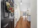 Front door entrance with hardwood floors and view into the living area at 5027 Billy K Trail, Myrtle Beach, SC 29579