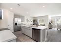 Modern kitchen with stainless steel appliances and island at 189 Ashworth Dr., Tabor City, NC 28463