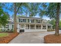 Renovated home showcasing a welcoming front porch at 204 Green Lake Dr., Myrtle Beach, SC 29572