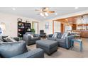 Cozy living room featuring comfortable seating and built-in shelving at 310 46Th Ave. N, North Myrtle Beach, SC 29582