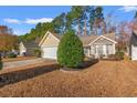 House exterior with a garage and landscaping at 352 Mckendree Ln., Myrtle Beach, SC 29579