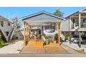 Covered RV pad with spacious deck and parking at 6001 - 5036 S Kings Highway, Myrtle Beach, SC 29575