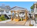 Covered RV pad with spacious deck and parking at 6001 - 5036 S Kings Highway, Myrtle Beach, SC 29575