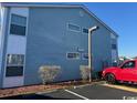 Side view of light blue building, showing parking area at 8830 B Cloister Dr. # 8830 - B, Myrtle Beach, SC 29575