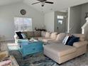 Spacious living room featuring a large sectional sofa and a blue coffee table at 914 Mary Read Dr., North Myrtle Beach, SC 29582