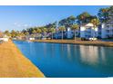 Community features a tranquil waterway with fountain at 1310 River Oaks Dr. # 2J, Myrtle Beach, SC 29579