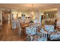 Modern kitchen with island and breakfast bar at 371 S Dunes Dr., Pawleys Island, SC 29585