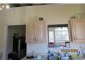 Kitchen with window overlooking backyard and light wood cabinets at 486 Blackberry Ln., Myrtle Beach, SC 29579