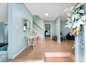 Bright entryway with hardwood floors and view of kitchen at 917 9Th Ave. S, North Myrtle Beach, SC 29582