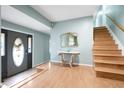 Inviting entryway with hardwood floors and elegant console table at 917 9Th Ave. S, North Myrtle Beach, SC 29582