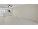 Bright living room with tile floors at 1301 Pridgen Rd. # 1104, Myrtle Beach, SC 29577