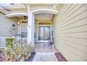 Relaxing front porch with rocking chairs and double front doors at 190 Sugar Loaf Ln., Murrells Inlet, SC 29576