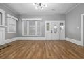 Bright living room featuring hardwood floors and a fireplace at 205 S Nichols St., Nichols, SC 29581