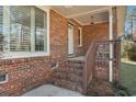 Brick front porch with steps leading to the front door at 2103 Loblolly St., Georgetown, SC 29440