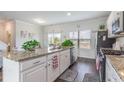 Spacious kitchen with granite countertops, stainless steel appliances, and an island at 326 High Falls Dr., Conway, SC 29526