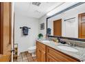 Bathroom with double sinks, granite countertop, and shower/tub combo at 4800 S Ocean Blvd. # 412, North Myrtle Beach, SC 29582