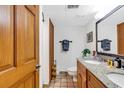 Bathroom with double sinks, granite countertop, and shower/tub combo at 4800 S Ocean Blvd. # 412, North Myrtle Beach, SC 29582