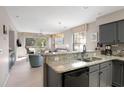 Open kitchen with granite countertops and gray cabinets at 650 Tupelo Ln. # 5-F, Longs, SC 29568