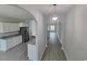 Modern kitchen with white cabinets and granite countertops at Tbb 2 Pee Dee Hwy., Conway, SC 29527