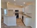 Modern kitchen with granite countertops and stainless steel appliances at Tbb 1 Pee Dee Hwy., Conway, SC 29527