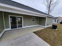 Covered back patio extends from the house, providing outdoor living space at Tbb 1 Pee Dee Hwy., Conway, SC 29527