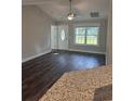 Bright living room with hardwood floors and access to front entrance at Tbd 3 Mineral Springs Rd., Conway, SC 29527
