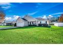 House exterior showcasing a front yard and neighborhood at 1041 Macala Dr., Conway, SC 29527